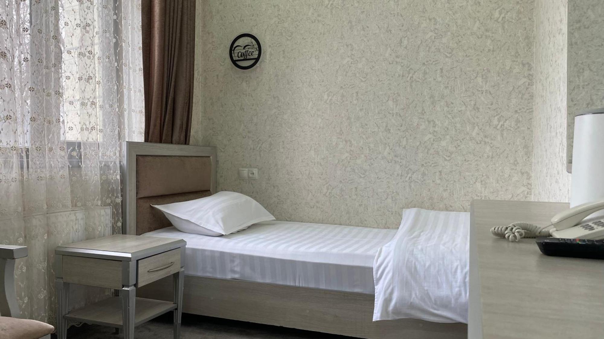 DIYOR Hotel Margilan Marghilon Buitenkant foto