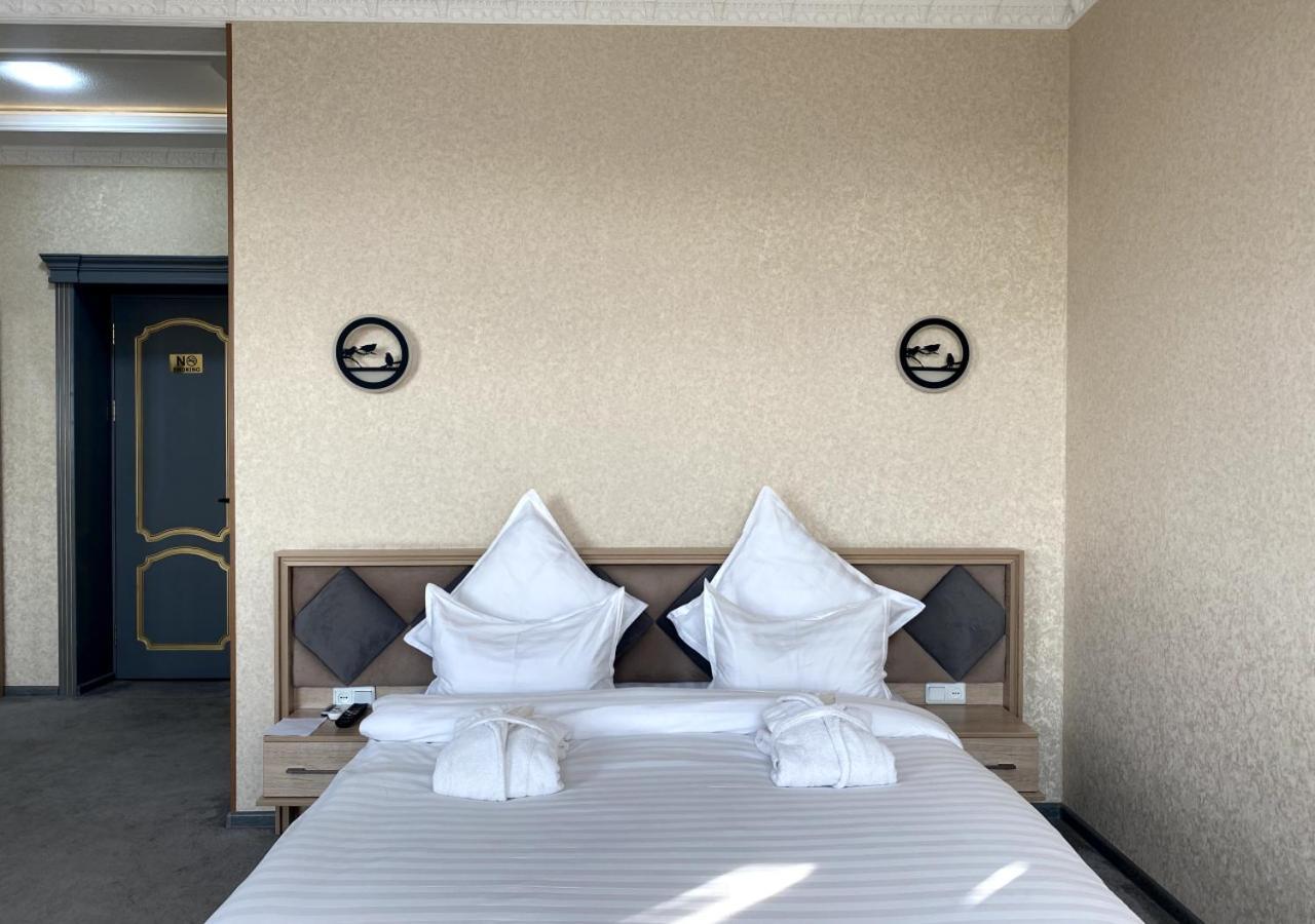 DIYOR Hotel Margilan Marghilon Buitenkant foto