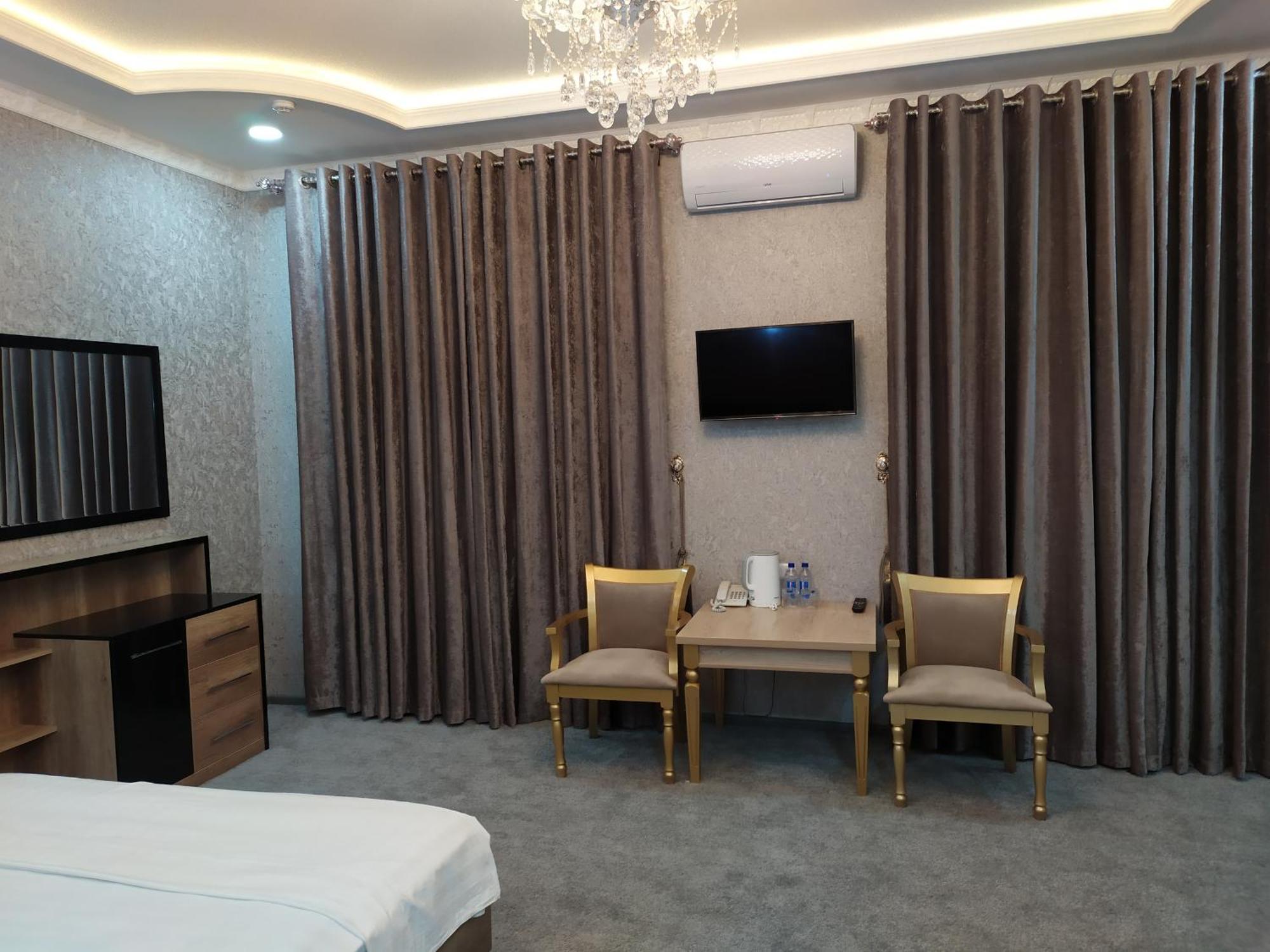 DIYOR Hotel Margilan Marghilon Buitenkant foto